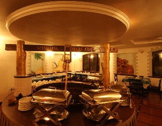 Imagen del bar/restaurante del Hotel Magnum Resort. Foto 3