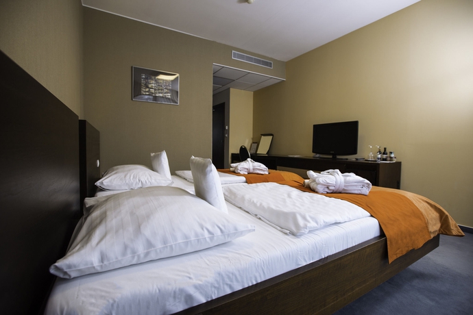 Imagen de la habitación del Hotel Magnus. Foto 11