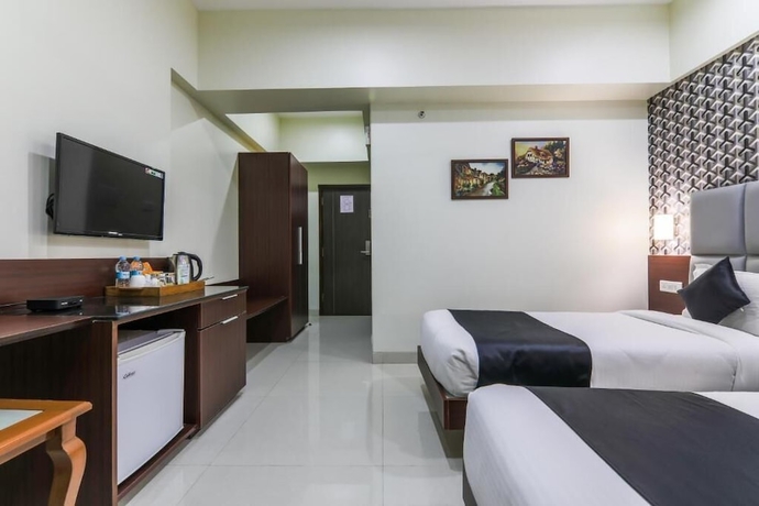 Imagen de la habitación del Hotel Magnus Square Business. Foto 12