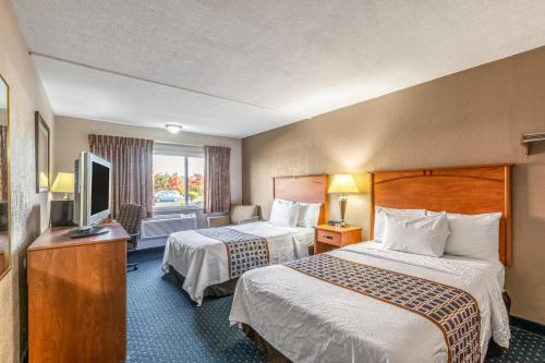 Imagen de la habitación del Hotel Magnuson Detroit Airport. Foto 6