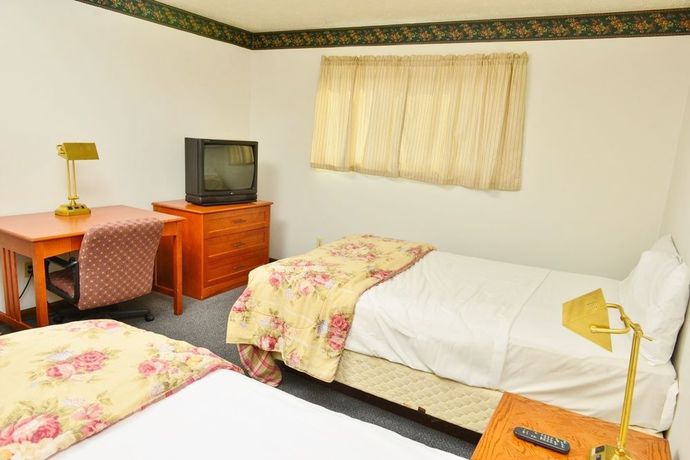 Imagen de la habitación del Hotel Magnuson Extended Stay Canton Ohio. Foto 3