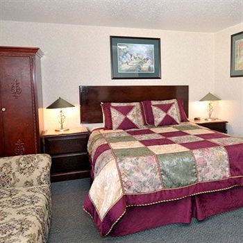 Imagen de la habitación del Hotel Magnuson Grace Inn. Foto 6