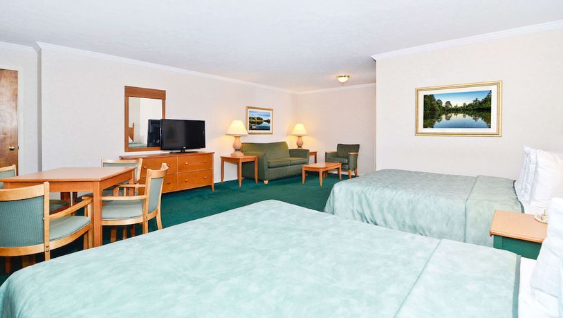 Imagen de la habitación del Hotel Magnuson Grand Pioneer Inn And Suites. Foto 2