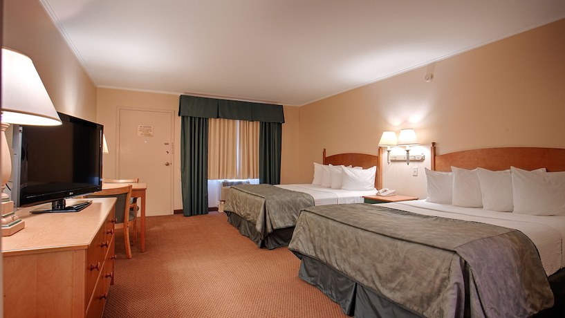 Imagen de la habitación del Hotel Magnuson Grand Pioneer Inn And Suites. Foto 4