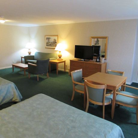 Imagen de la habitación del Hotel Magnuson Grand Pioneer Inn And Suites. Foto 8