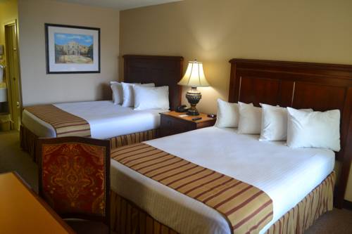 Imagen de la habitación del Hotel Magnuson Grand and Conference Center Tyler. Foto 11