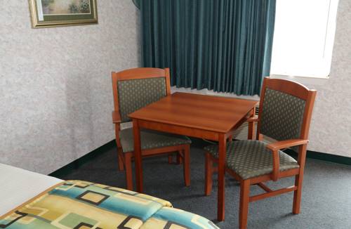 Imagen de la habitación del Hotel Magnuson Howell/brighton. Foto 5