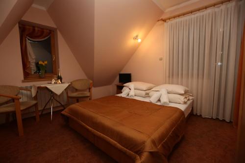 Imagen de la habitación del Hotel Małgosia. Foto 13