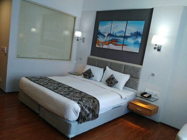 Imagen de la habitación del Hotel Maha Bodhi Resort Convention Centre. Foto 18