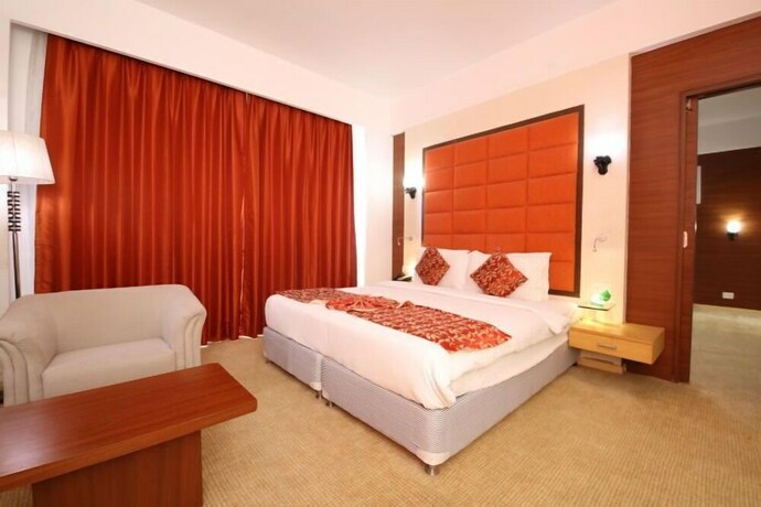 Imagen de la habitación del Hotel Maha Bodhi Resort Convention Centre. Foto 23
