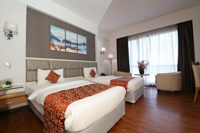 Imagen de la habitación del Hotel Maha Bodhi Resort Convention Centre. Foto 26