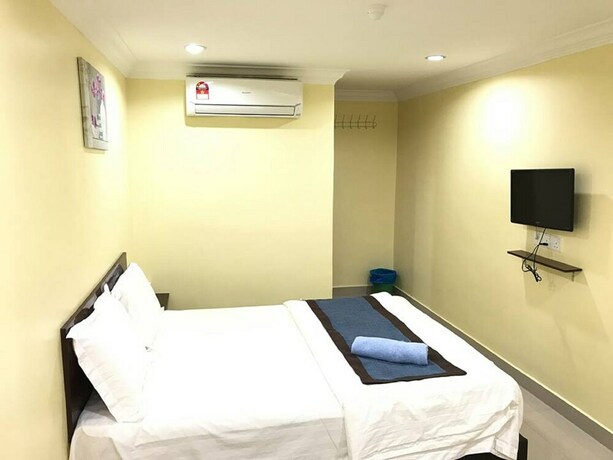 Imagen de la habitación del Hotel Maha. Foto 10