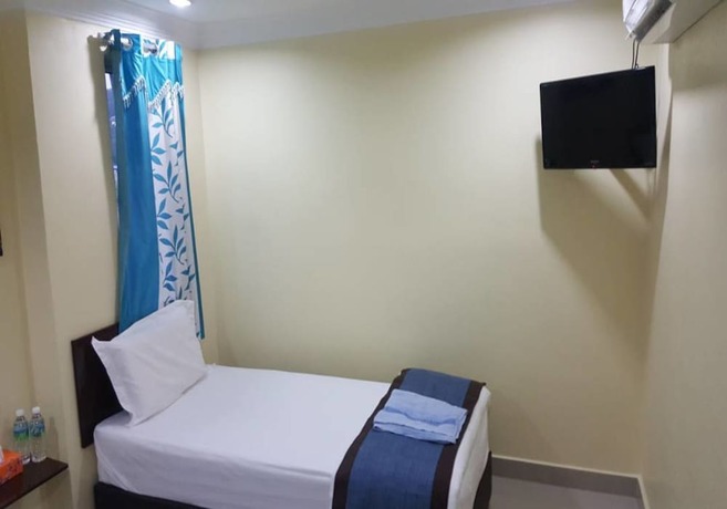Imagen de la habitación del Hotel Maha. Foto 15