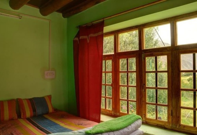 Imagen de la habitación del Hotel Maha Guest House. Foto 14