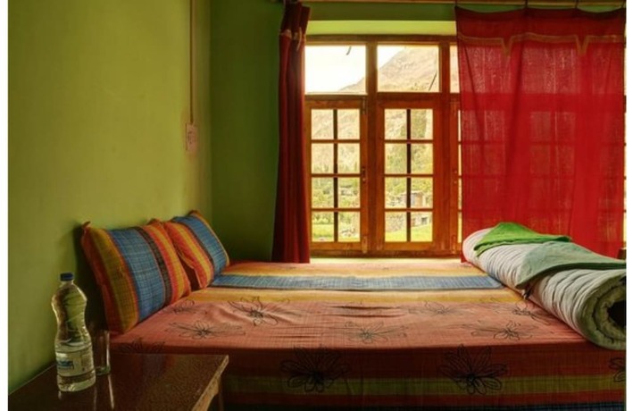 Imagen de la habitación del Hotel Maha Guest House. Foto 15