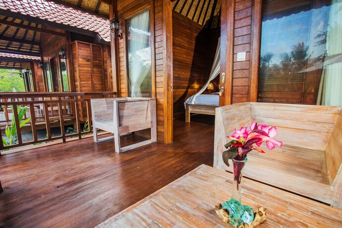 Imagen de la habitación del Hotel Maha Guru Huts. Foto 24
