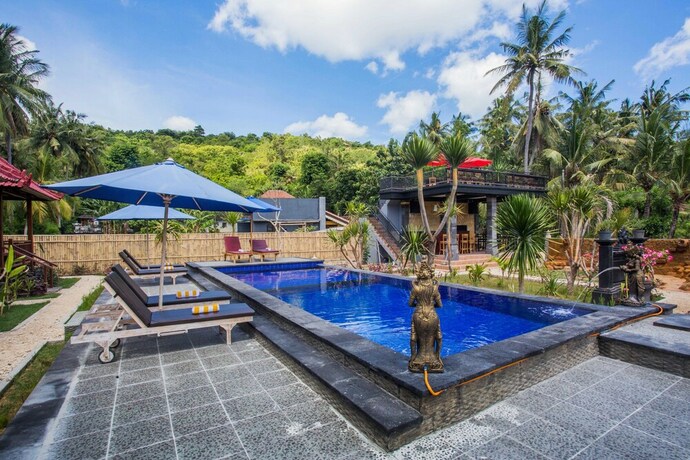 Imagen de la piscina del Hotel Maha Guru Huts. Foto 36