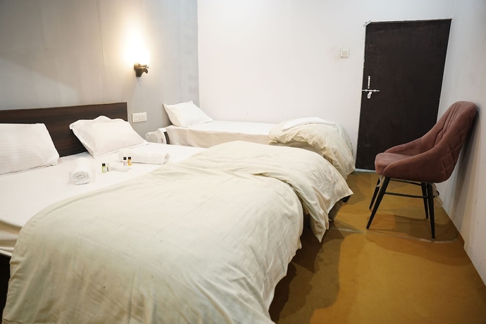 Imagen de la habitación del Hotel Maha Kumbh Mandapam. Foto 13