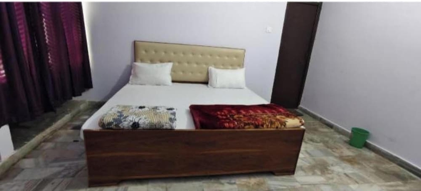 Imagen de la habitación del Hotel Mahadev inn. Foto 7