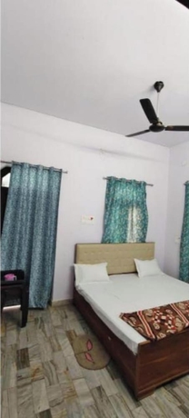 Imagen de la habitación del Hotel Mahadev inn. Foto 9