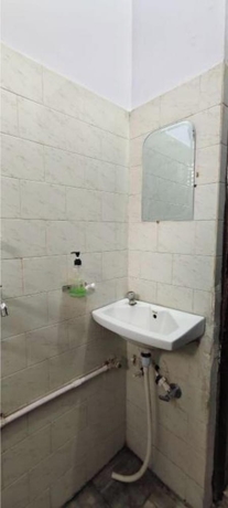 Imagen de la habitación del Hotel Mahadev inn. Foto 11