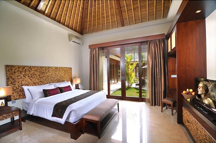 Imagen de la habitación del Hotel Mahagiri Villas and Spa Dreamland. Foto 4