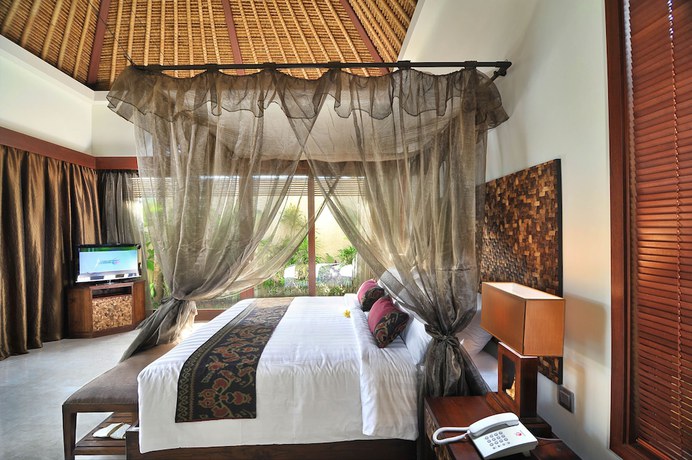 Imagen de la habitación del Hotel Mahagiri Villas and Spa Dreamland. Foto 5