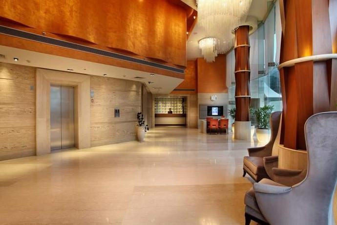 Imagen de la habitación del Hotel Mahagun Sarovar Portico Suites Ghaziabad. Foto 5