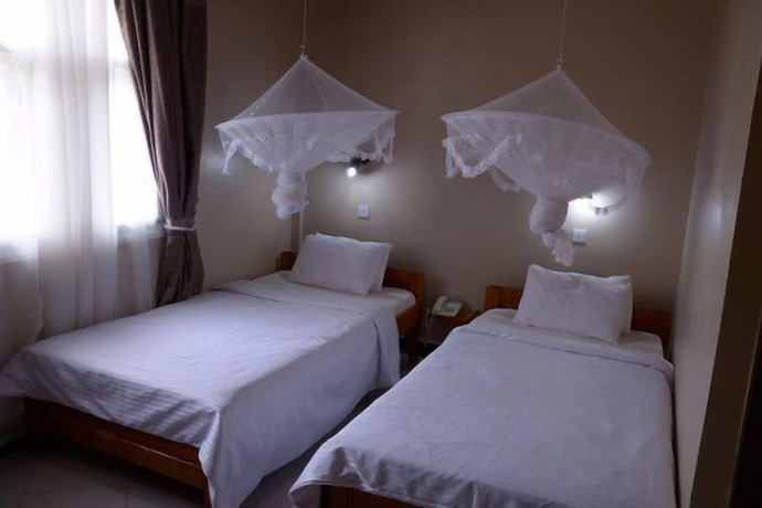 Imagen de la habitación del Hotel Mahale Classic Lodge. Foto 9