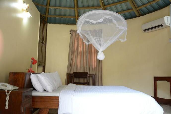 Imagen de la habitación del Hotel Mahale Classic Lodge. Foto 10