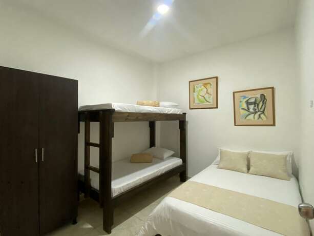 Imagen de la habitación del Hotel Mahalo Hostel Boutique. Foto 13