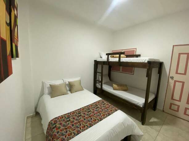 Imagen de la habitación del Hotel Mahalo Hostel Boutique. Foto 15