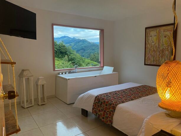 Imagen de la habitación del Hotel Mahalo Hostel Boutique. Foto 19