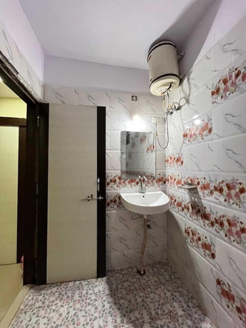 Imagen de la habitación del Hotel Maharaja Homestay. Foto 10