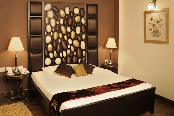Imagen de la habitación del Hotel Maharaja Regency, Ludhiana. Foto 12