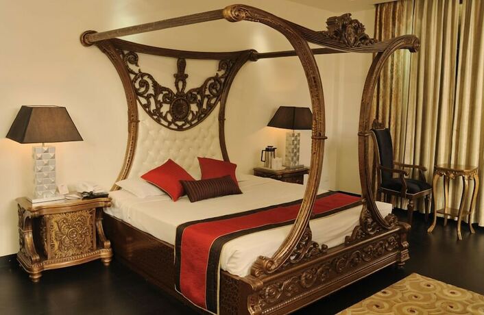Imagen de la habitación del Hotel Maharaja Regency, Ludhiana. Foto 13