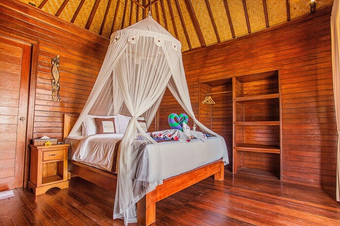 Imagen de la habitación del Hotel Maharatu Villas. Foto 20
