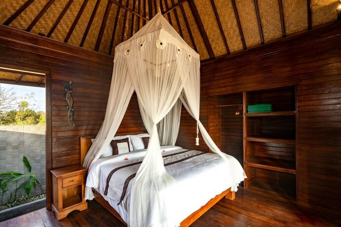Imagen de la habitación del Hotel Maharatu Villas. Foto 21