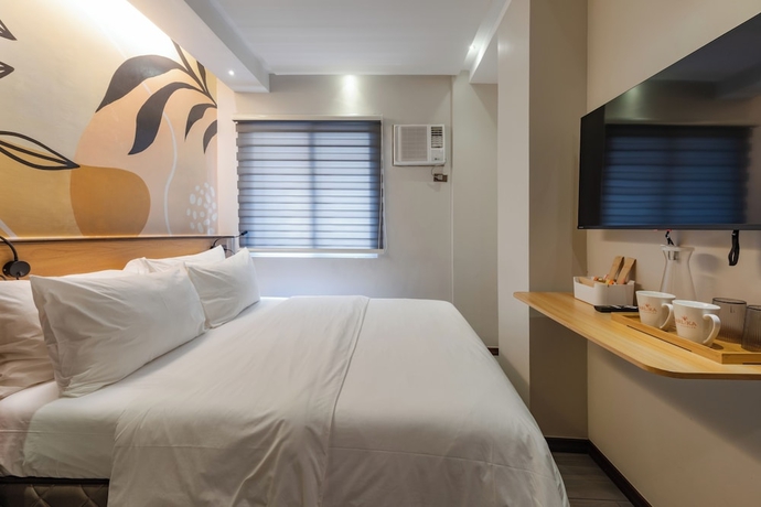 Imagen de la habitación del Hotel Maharlika City Inn. Foto 9