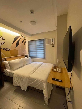 Imagen de la habitación del Hotel Maharlika City Inn. Foto 10