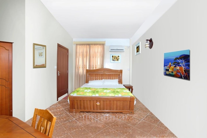 Imagen de la habitación del Hotel Mahe Holiday Resort. Foto 9