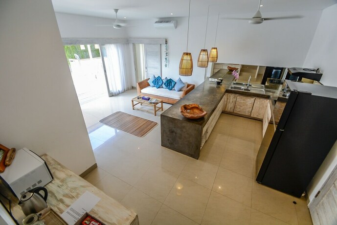 Imagen de la habitación del Hotel Mahi Mahi Villa and Suites. Foto 17