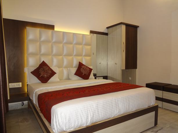 Imagen de la habitación del Hotel Mahima. Foto 9