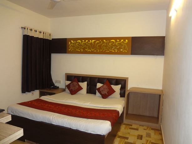 Imagen de la habitación del Hotel Mahima. Foto 11