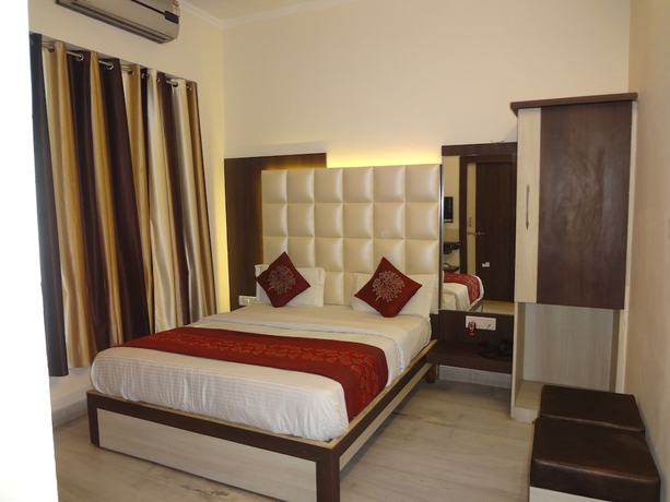 Imagen de la habitación del Hotel Mahima. Foto 12