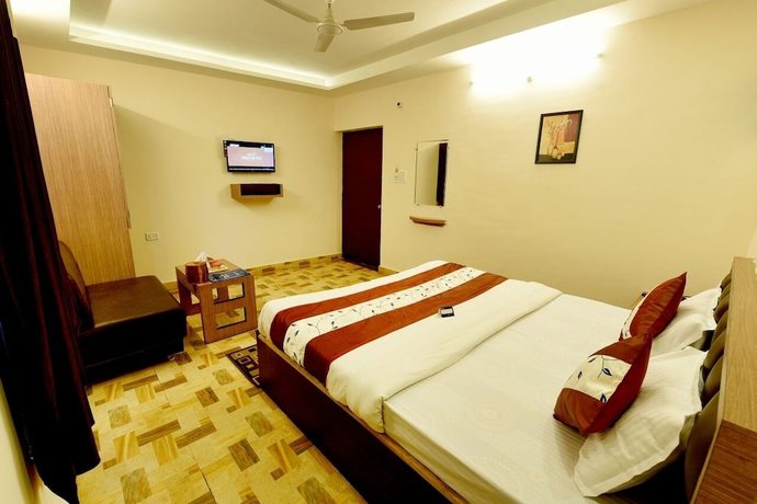 Imagen de la habitación del Hotel Mahima. Foto 13