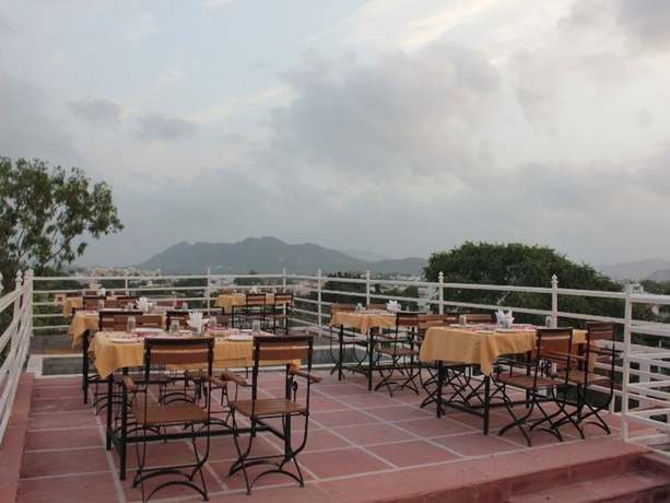 Imagen del bar/restaurante del Hotel Mahima Palace A Unit of Atlas Ventures. Foto 4