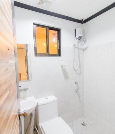 Imagen de la habitación del Hotel Mahogany Tourist Inn. Foto 8