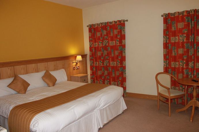Imagen de la habitación del Hotel Mahons. Foto 11