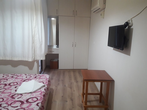 Imagen de la habitación del Hotel Mahper. Foto 17